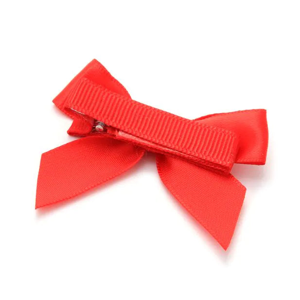 Set Of 4 Assorted Pink Bow Clips
